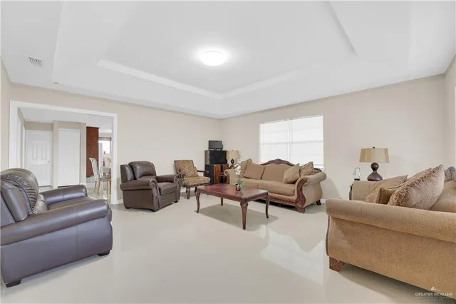 a living room with furniture and a couch