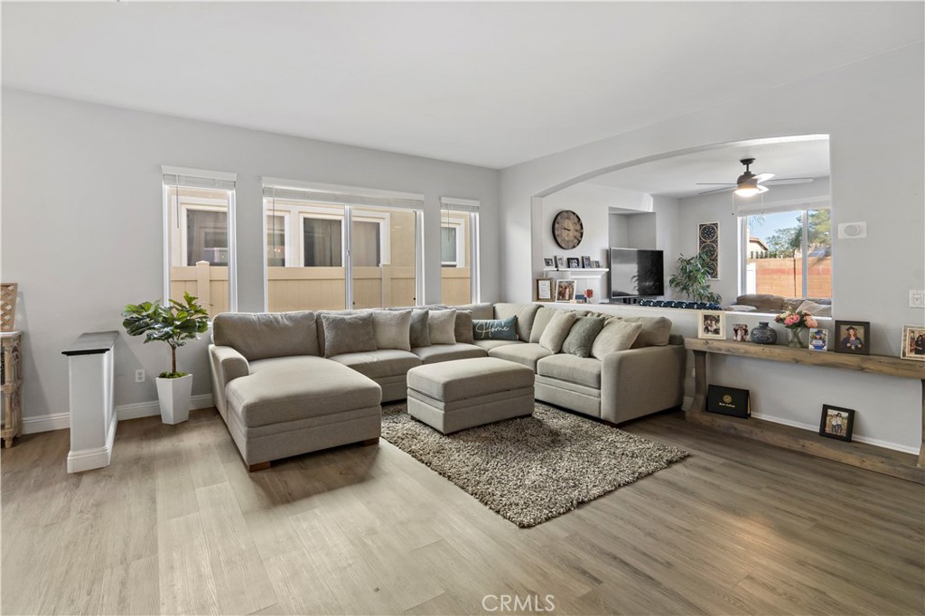 1664 Rigel Street Beaumont, CA 92223 - Photo 7 of 32 a living room with furniture and a large window