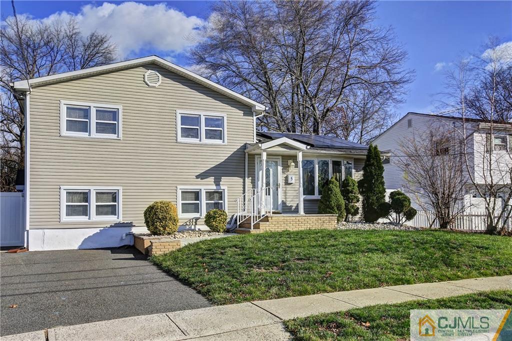 5 Baldwin Road Edison, NJ 08817 - Photo 2 of 25 a front view of a house with garden