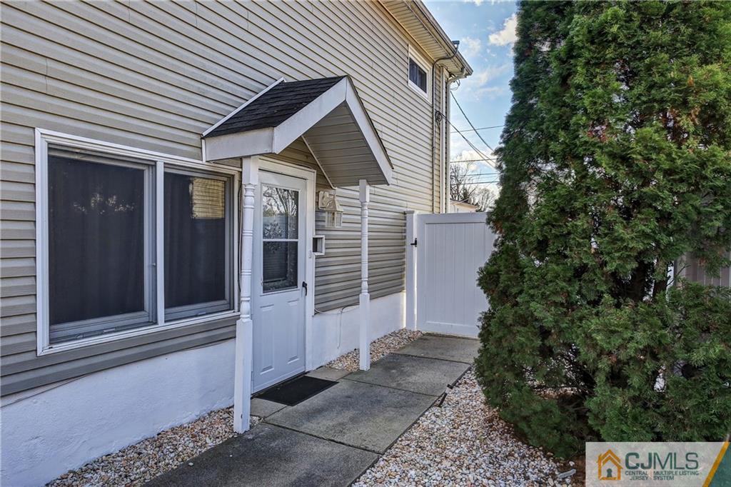 5 Baldwin Road Edison, NJ 08817 - Photo 24 of 25 a front view of a house with garden