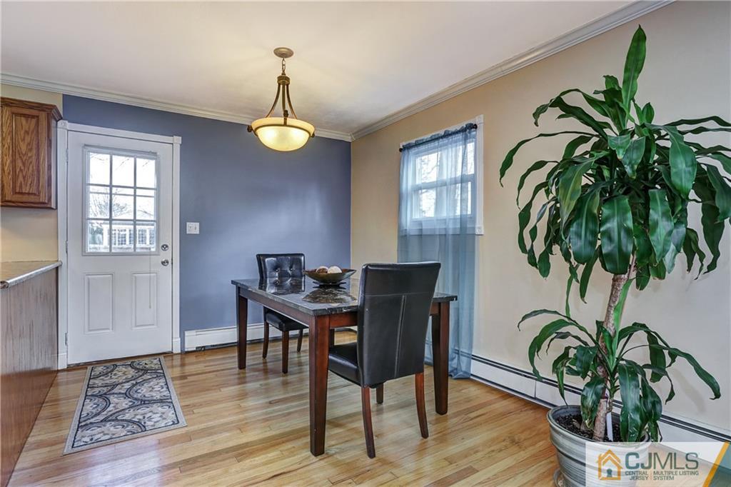 5 Baldwin Road Edison, NJ 08817 - Photo 5 of 25 a workspace with furniture window and wooden floor