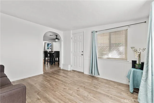 a view of livingroom with furniture and a window