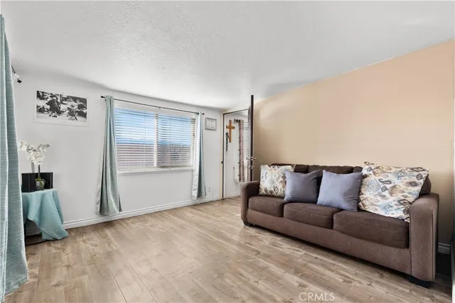 a living room with furniture and window