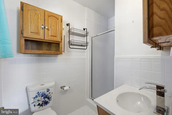 a bathroom with a sink a vanity and a mirror