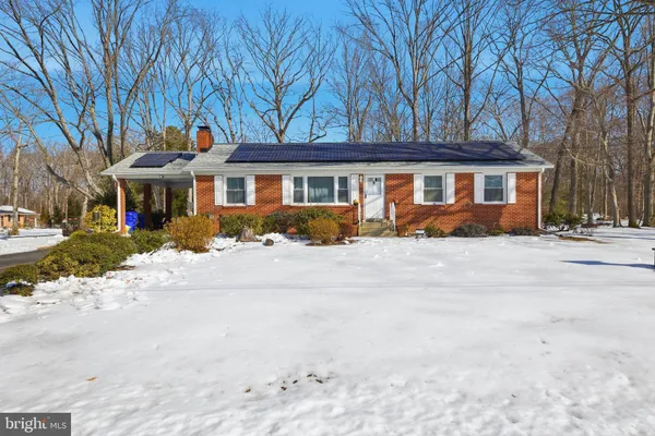 front view of house with a yard