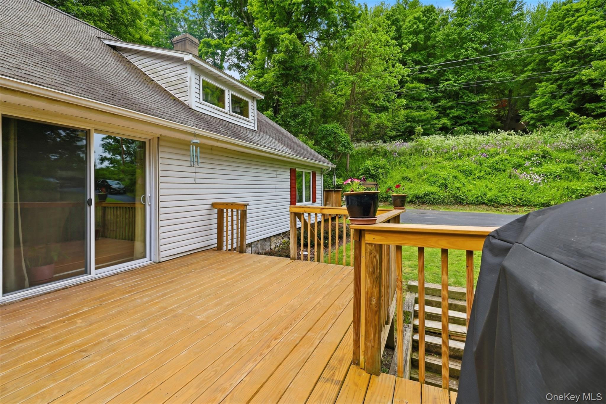 236 Hosner Mountain Road Hopewell Junction, NY 12533 - Photo 43 of 46 Expansive wood deck featuring a natural finish with sliders to living room