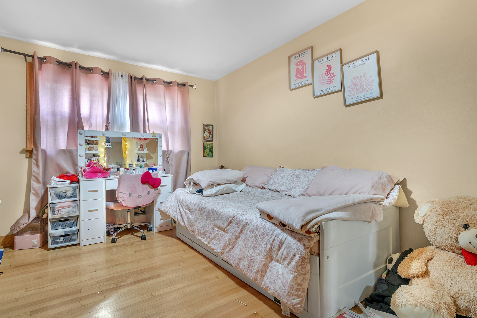 6048 West 79th Street Burbank, IL 60459 - Photo 12 of 34 a bedroom with a bed and a window