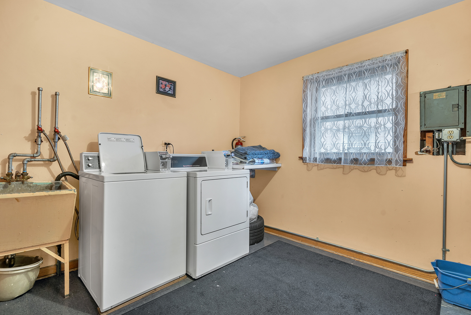 6048 West 79th Street Burbank, IL 60459 - Photo 26 of 34 a room with storage and utility