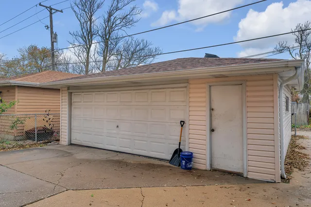 a view of a house with a garage