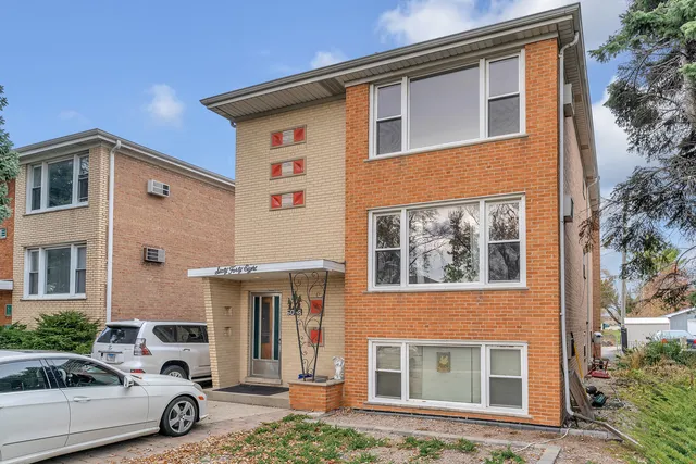 a car parked in front of a house