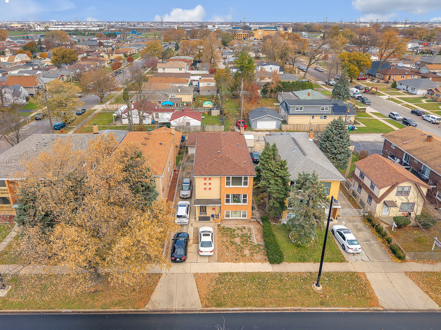 6048 West 79th Street Burbank, IL 60459 - Photo 4 of 34 an aerial view of residential houses with yard