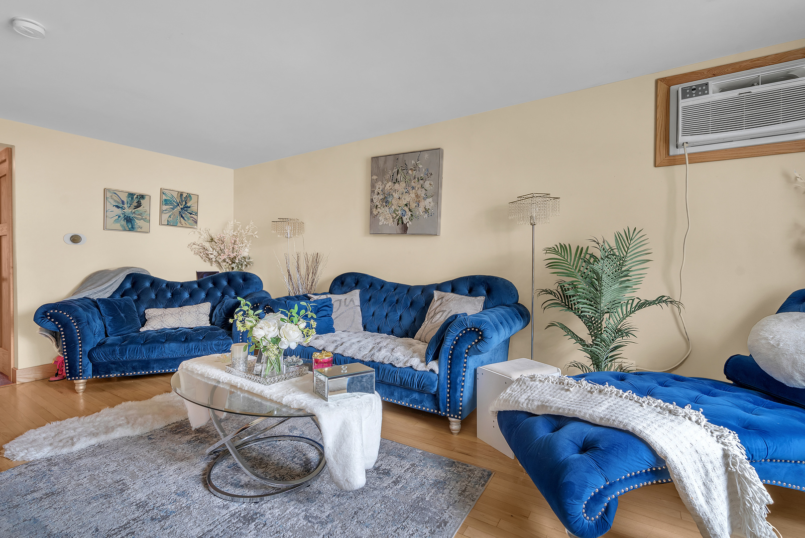 6048 West 79th Street Burbank, IL 60459 - Photo 6 of 34 a living room with furniture and a potted plant
