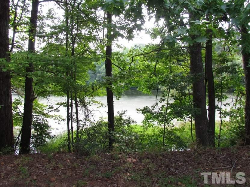 224 Bayleaf Drive Raleigh, NC 27615 - Photo 22 of 22 a backyard of a house with lots of green space
