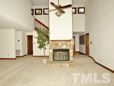 224 Bayleaf Drive Raleigh, NC 27615 - Photo 5 of 22 a view of a hallway with entryway