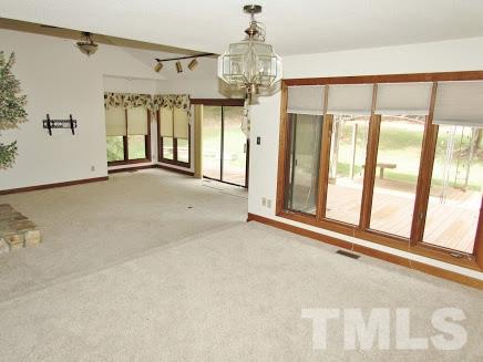 224 Bayleaf Drive Raleigh, NC 27615 - Photo 6 of 22 a view of an empty room with a window