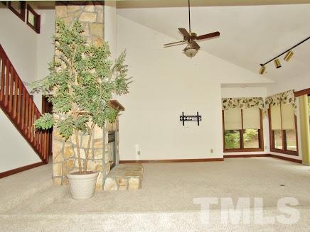 224 Bayleaf Drive Raleigh, NC 27615 - Photo 7 of 22 a view of a room with a potted plant