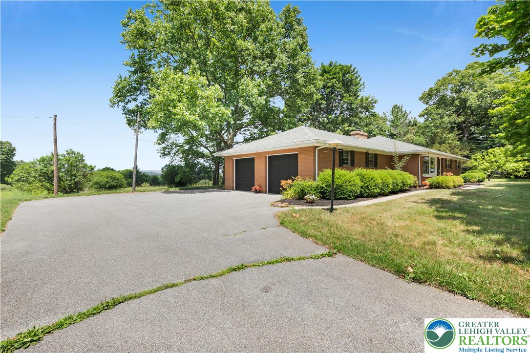 5747 Kernsville Road Orefield, PA 18069 - Photo 48 of 56 a house view with a garden space