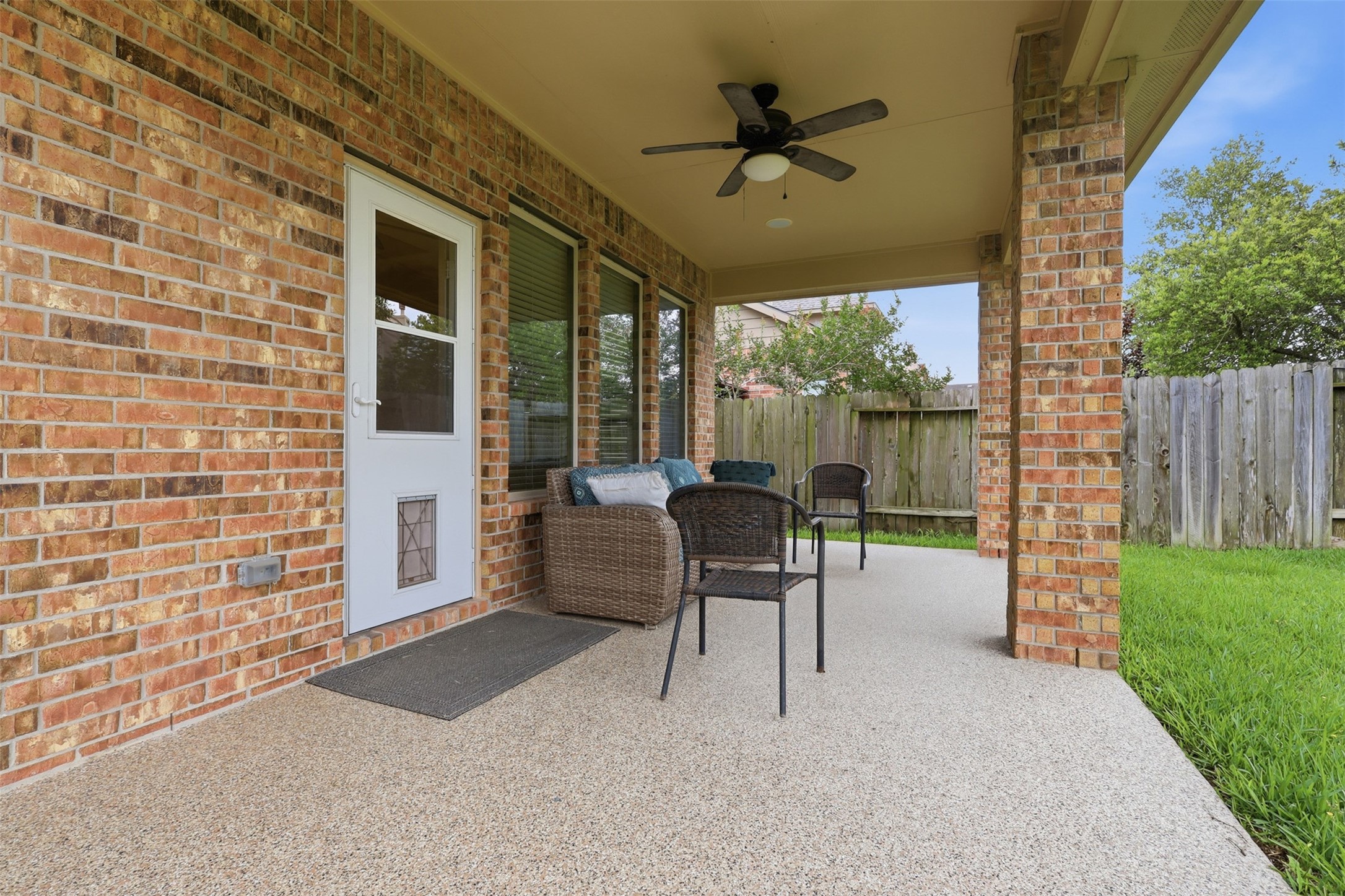 22943 Dale River Road Tomball, TX 77375 - Photo 27 of 29 a view of a porch with furniture and a yard