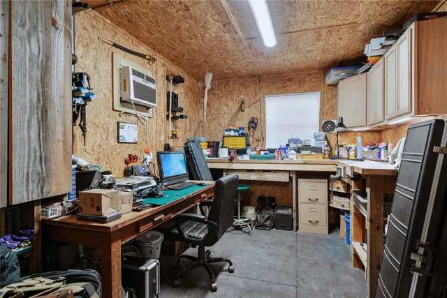 a view of a car parked in front of a house