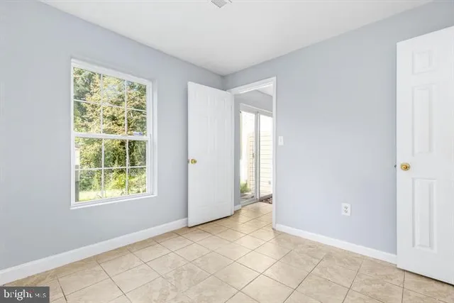 a view of an empty room with window