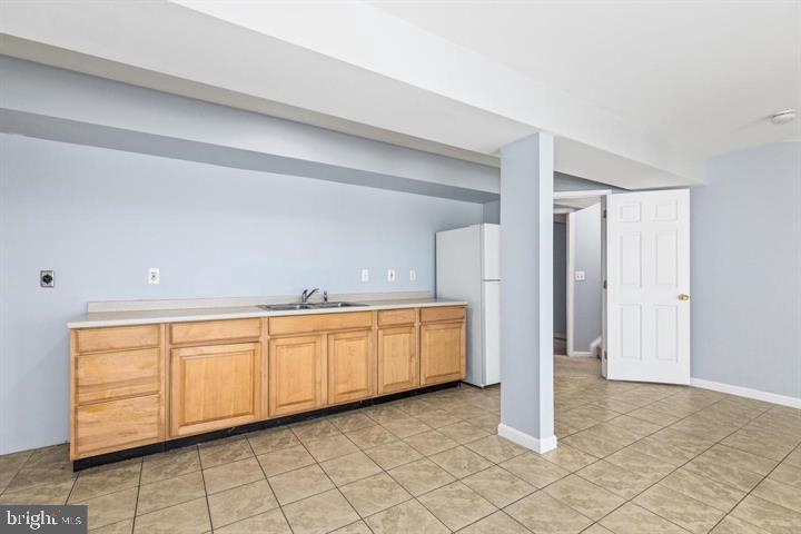 1766 Ann Scarlet Court Woodbridge, VA 22191 - Photo 6 of 11 a view of a kitchen with refrigerator