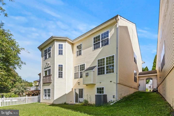 1766 Ann Scarlet Court Woodbridge, VA 22191 - Photo 10 of 11 a front view of a house with a yard