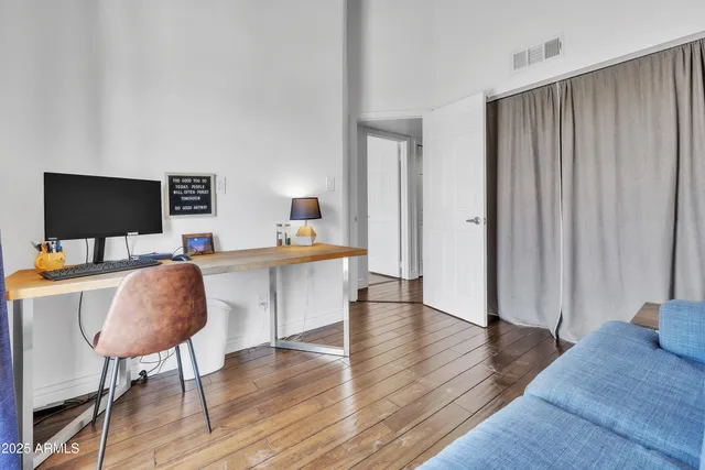 a workspace with furniture and window