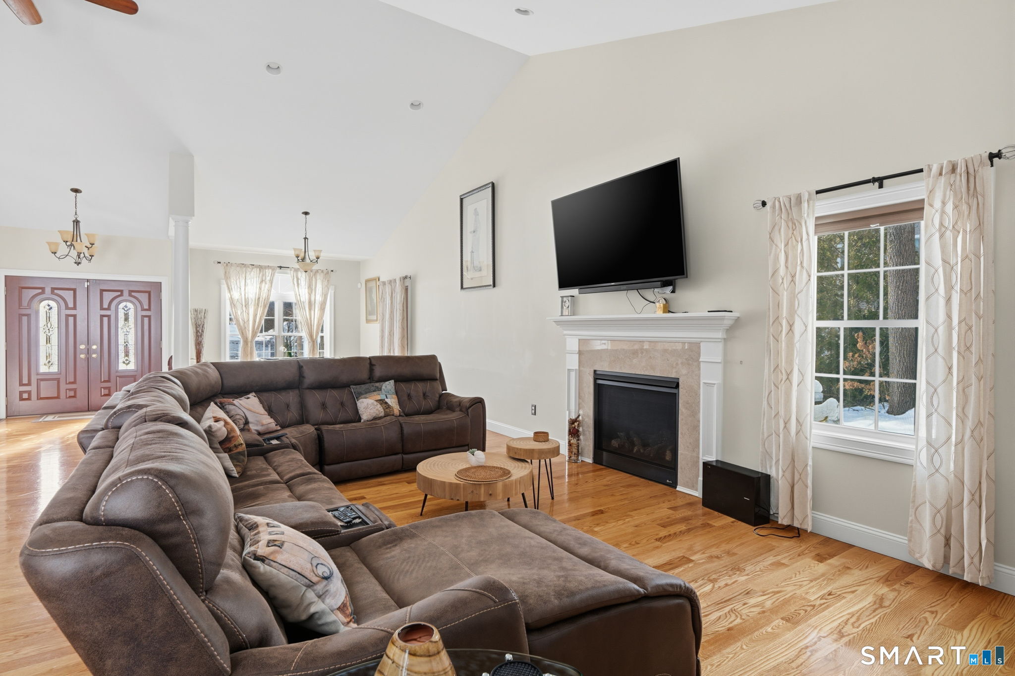 16 Crystal Brook Road Wolcott, CT 06716 - Photo 13 of 40 a living room with furniture fireplace and flat screen tv