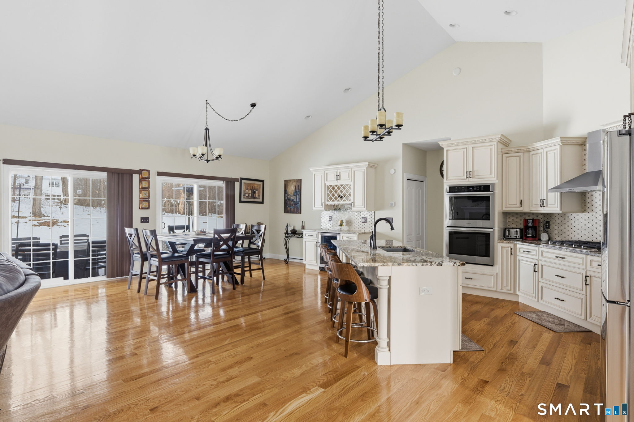 16 Crystal Brook Road Wolcott, CT 06716 - Photo 14 of 40 a view of a dining room with furniture window and wooden floor
