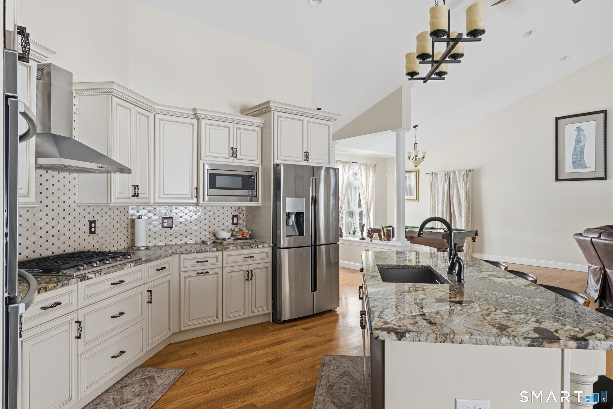 16 Crystal Brook Road Wolcott, CT 06716 - Photo 17 of 40 a kitchen with stainless steel appliances granite countertop a sink stove and refrigerator