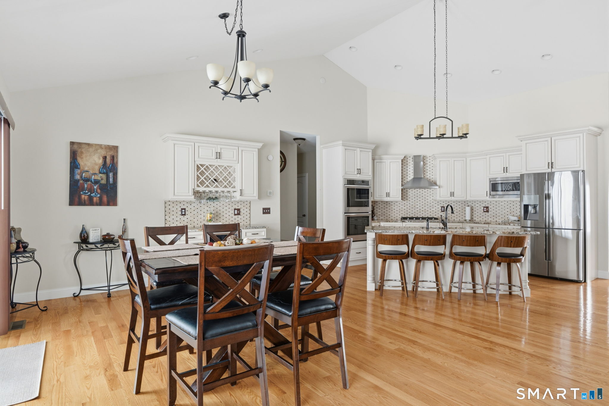16 Crystal Brook Road Wolcott, CT 06716 - Photo 21 of 40 a view of a dining room with furniture window and wooden floor