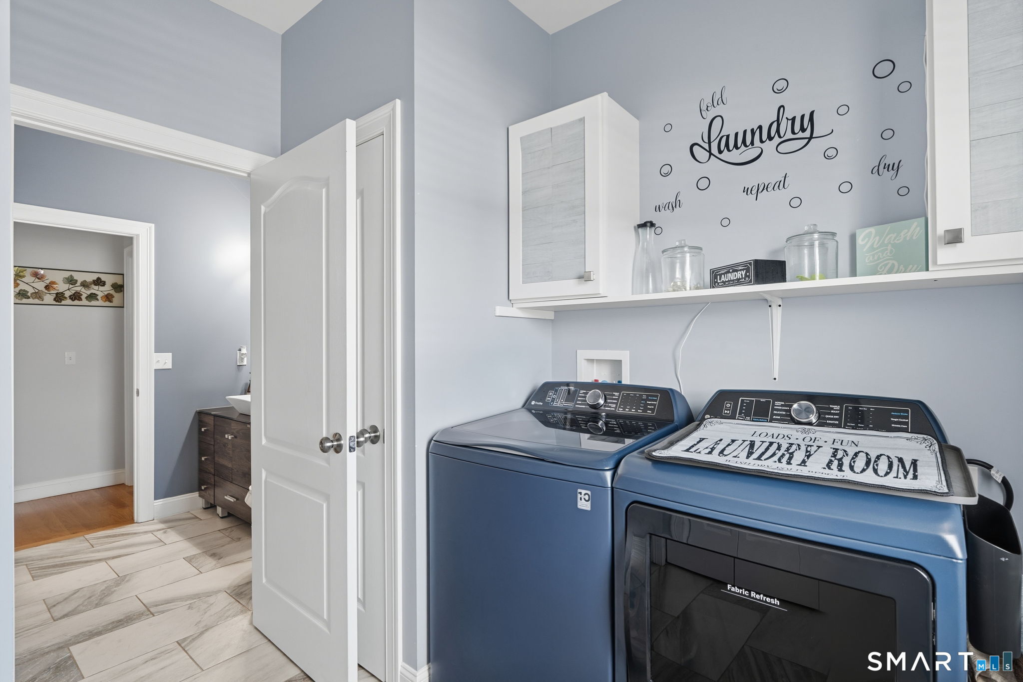16 Crystal Brook Road Wolcott, CT 06716 - Photo 25 of 40 a view of a utility room with washer and dryer
