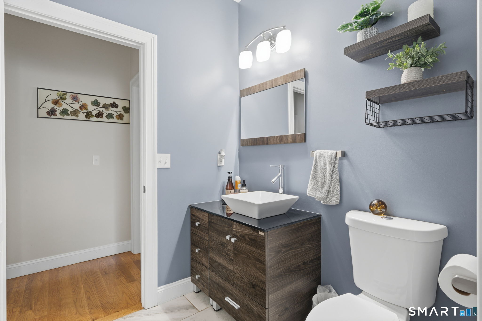 16 Crystal Brook Road Wolcott, CT 06716 - Photo 26 of 40 a bathroom with a toilet sink and mirror