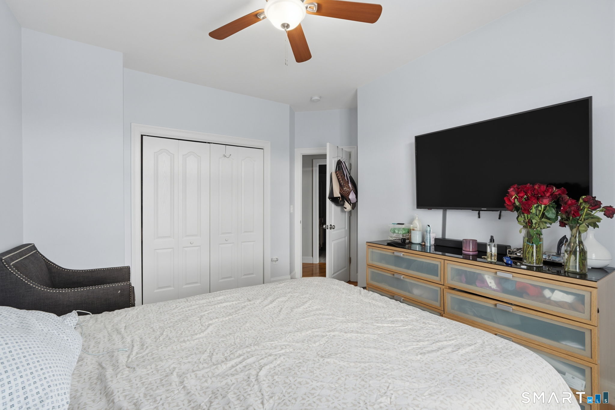 16 Crystal Brook Road Wolcott, CT 06716 - Photo 28 of 40 a bedroom with a bed and a flat screen tv