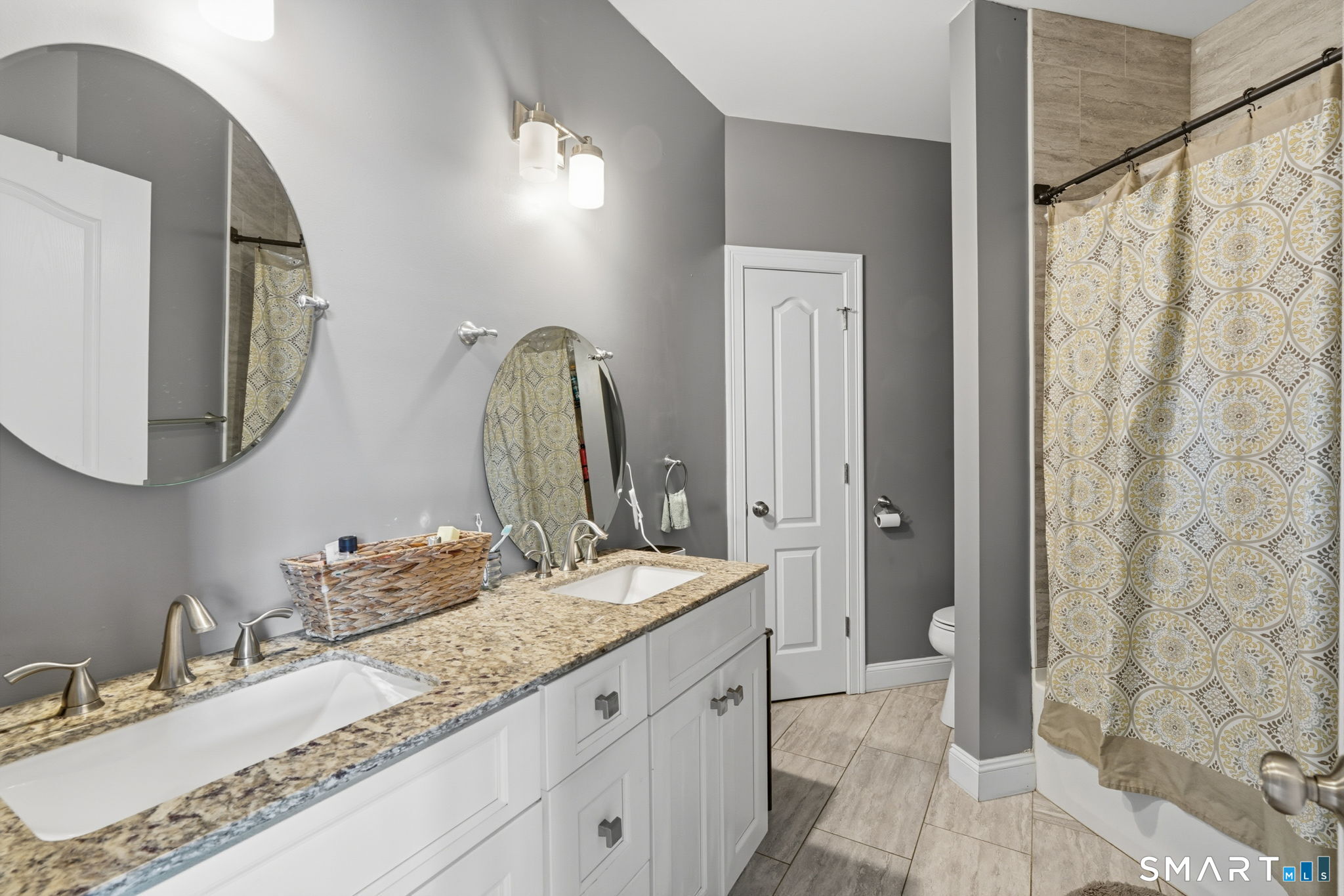 16 Crystal Brook Road Wolcott, CT 06716 - Photo 31 of 40 a bathroom with a granite countertop sink and a mirror