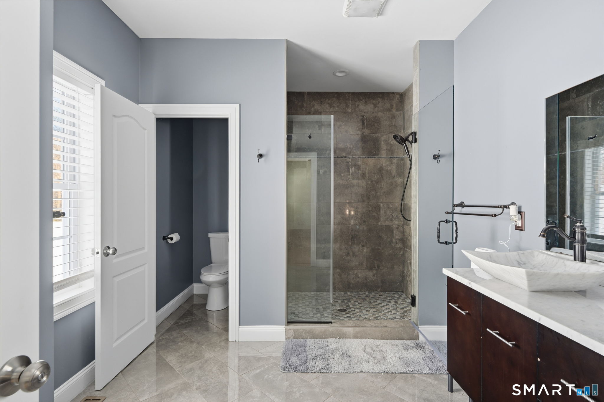 16 Crystal Brook Road Wolcott, CT 06716 - Photo 35 of 40 a bathroom with a shower and a sink