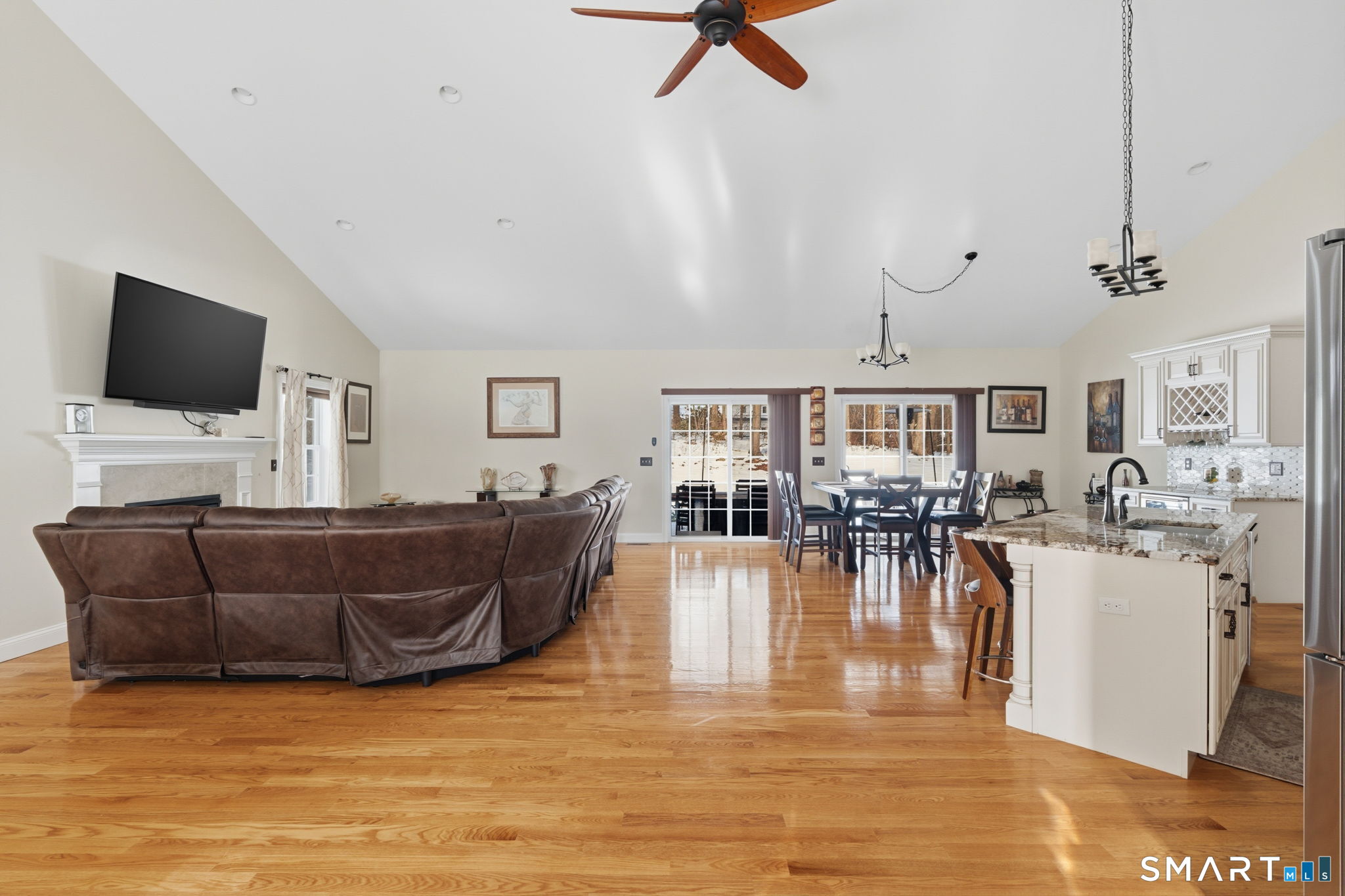 16 Crystal Brook Road Wolcott, CT 06716 - Photo 6 of 40 a living room with furniture and a flat screen tv