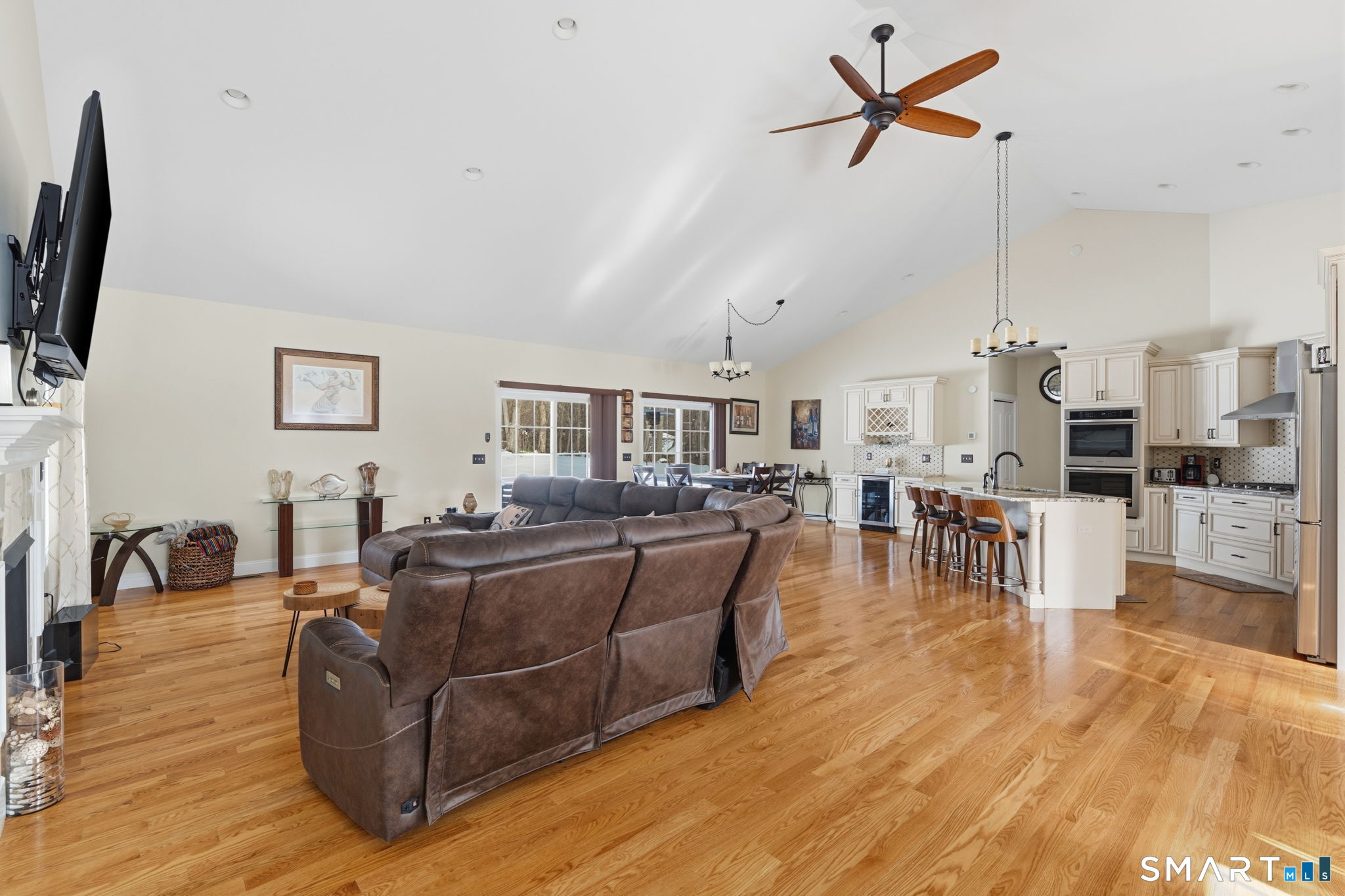 16 Crystal Brook Road Wolcott, CT 06716 - Photo 7 of 40 a living room with furniture and a flat screen tv