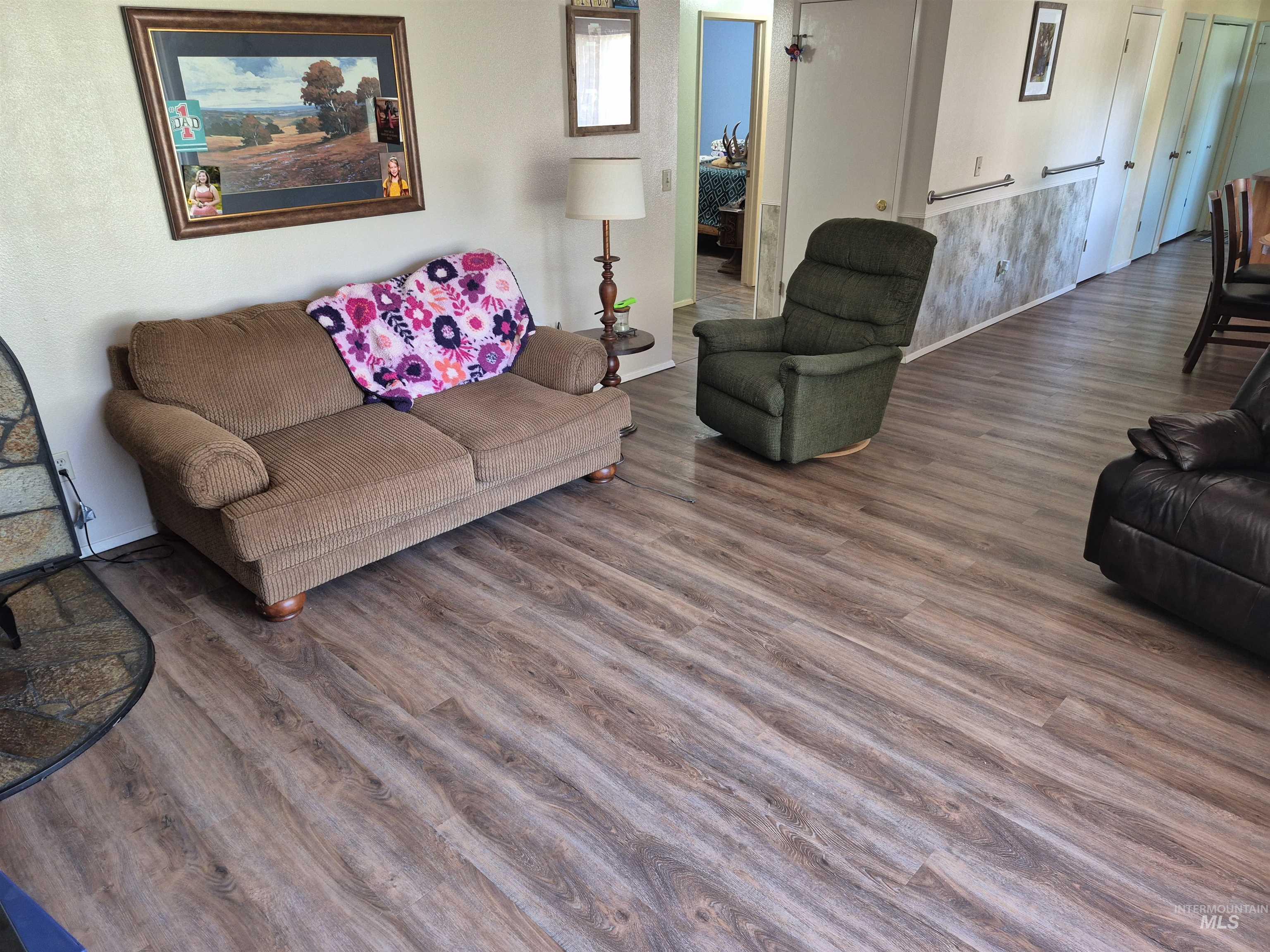 701 Wheeler Street Kendrick, ID 83537 - Photo 15 of 32 Living room with wood finished floors and baseboards