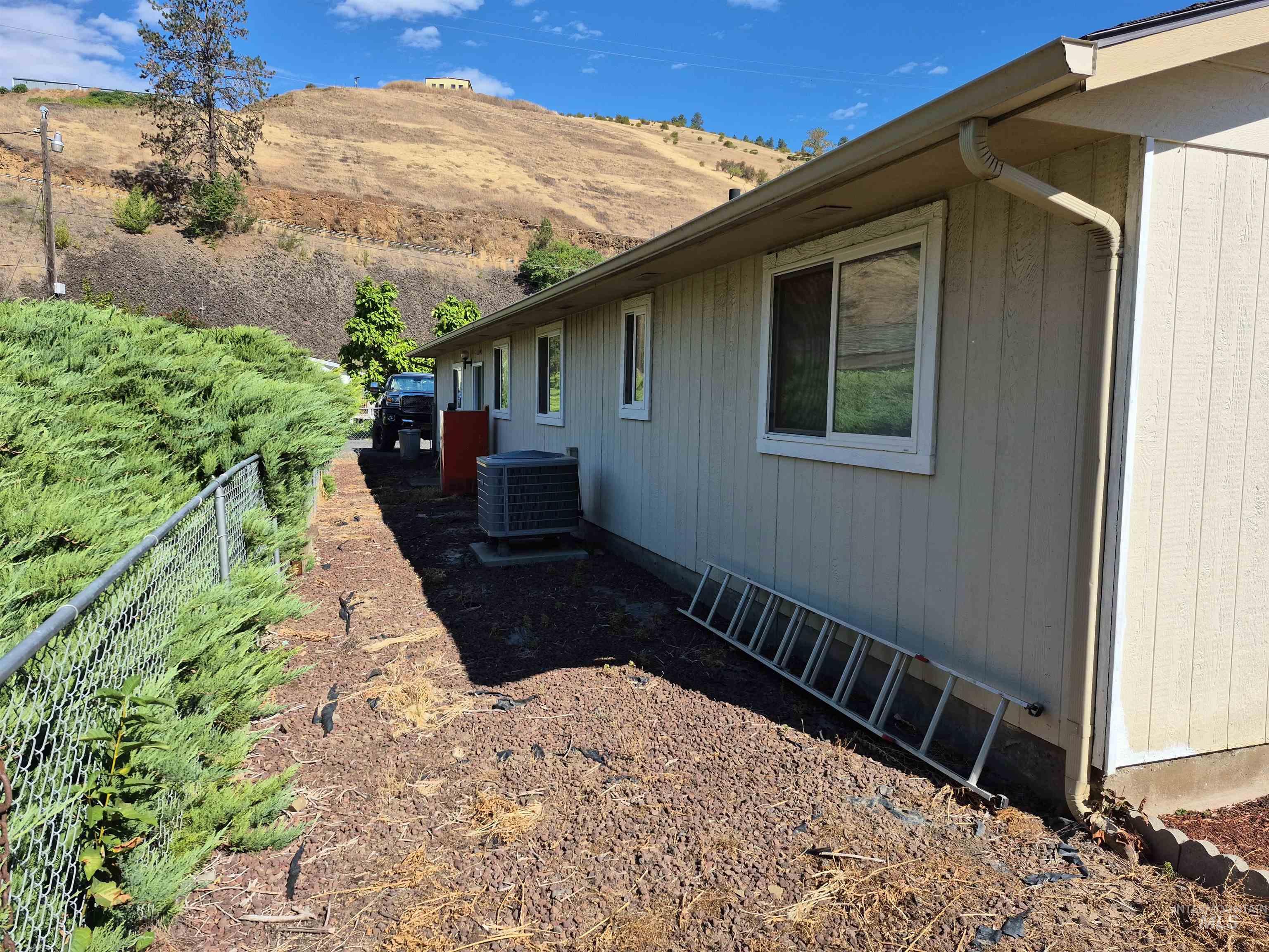 701 Wheeler Street Kendrick, ID 83537 - Photo 3 of 32 View of home's exterior with a cooling unit
