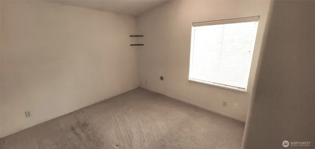 an empty room with a window