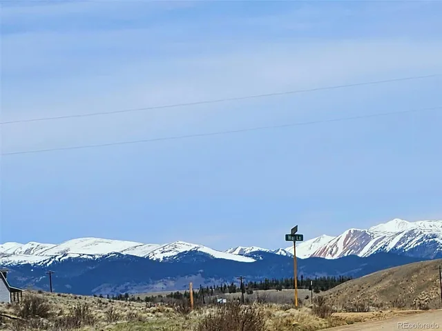 a view of a bedroom with a bed