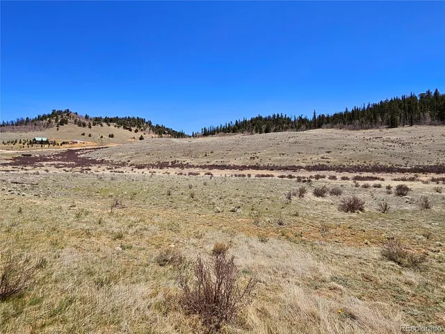 a view of large sky with mountain view