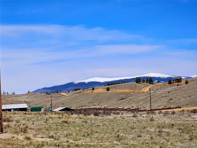 a view of a road with an ocean view