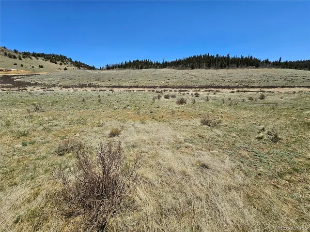 a view of mountain with sunset view