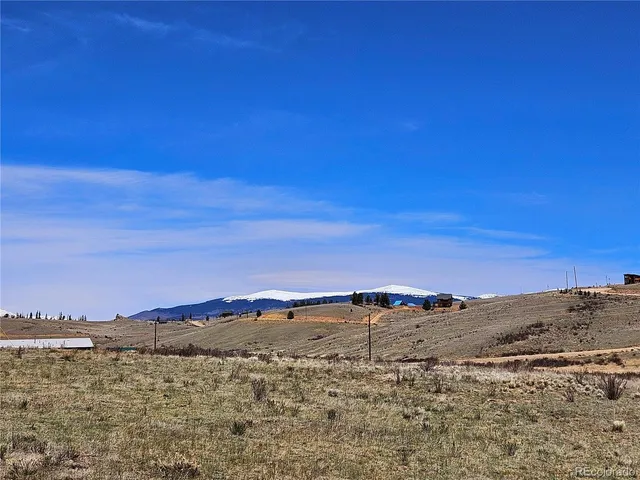 a view of ocean with sunset