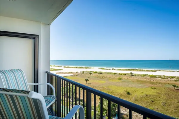 a view of a lake from a balcony