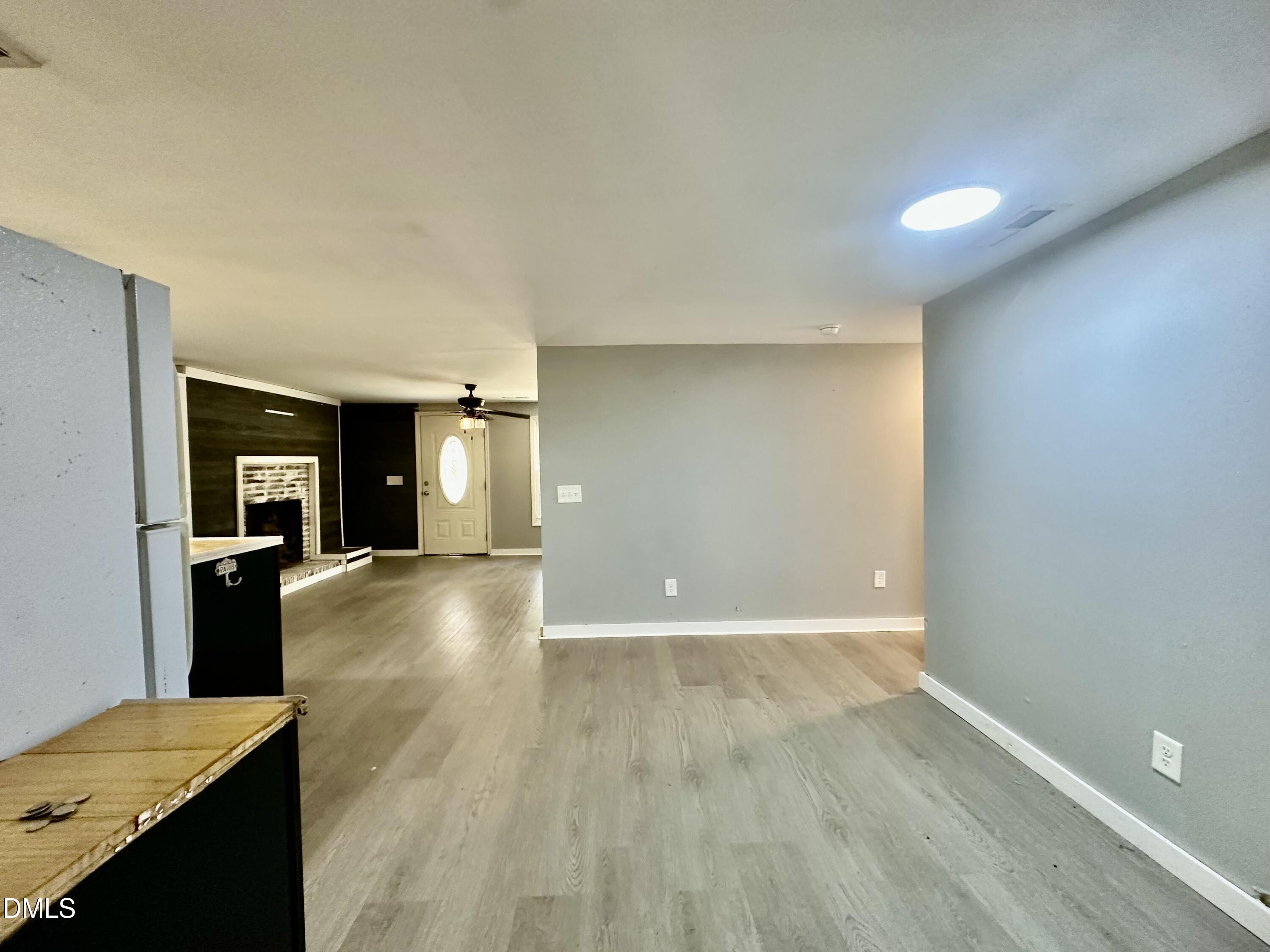 8205 Old Switchboard Road Snow Camp, NC 27349 - Photo 12 of 25 a view of a kitchen with a sink and a refrigerator