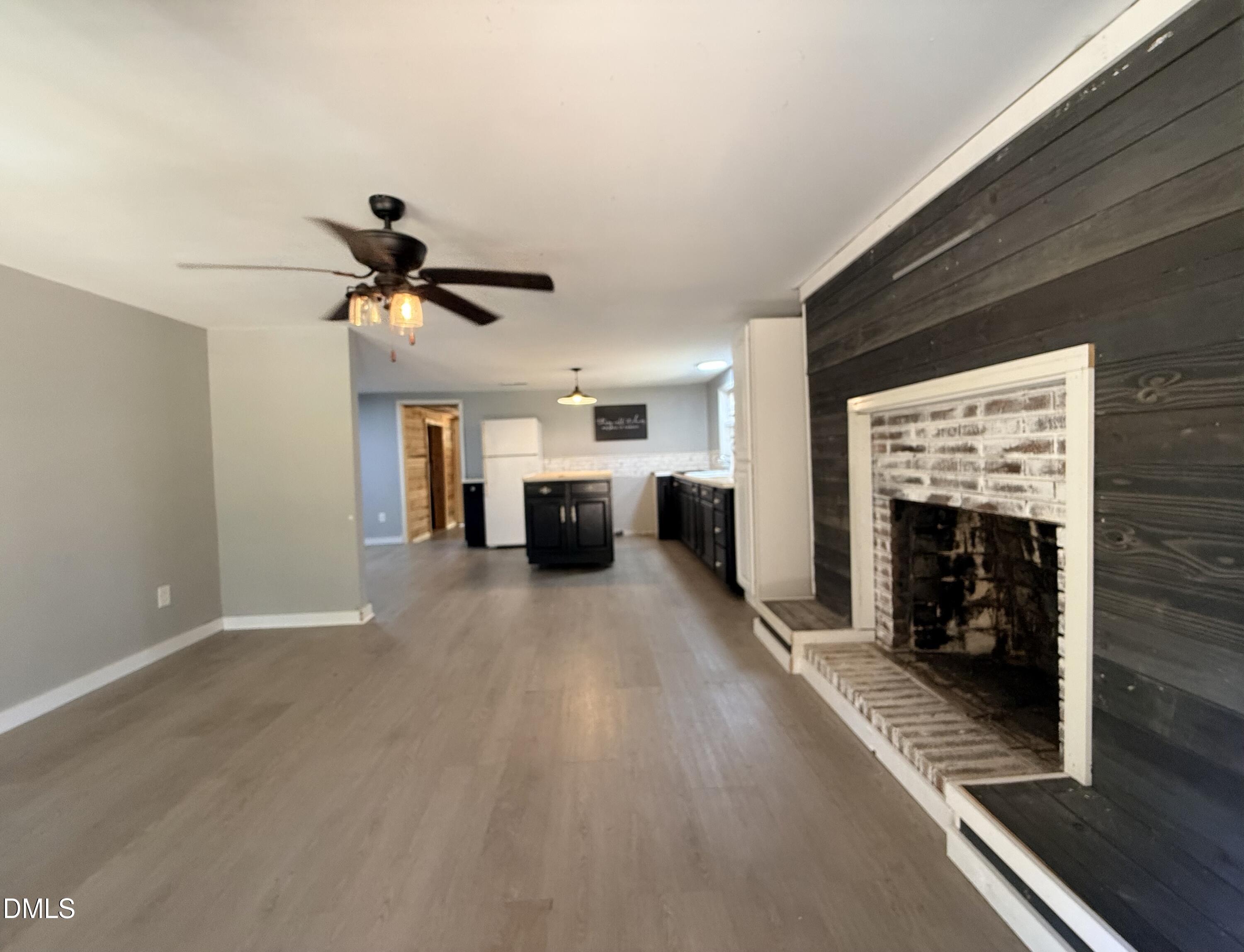 8205 Old Switchboard Road Snow Camp, NC 27349 - Photo 3 of 25 a view of living room with furniture and fireplace
