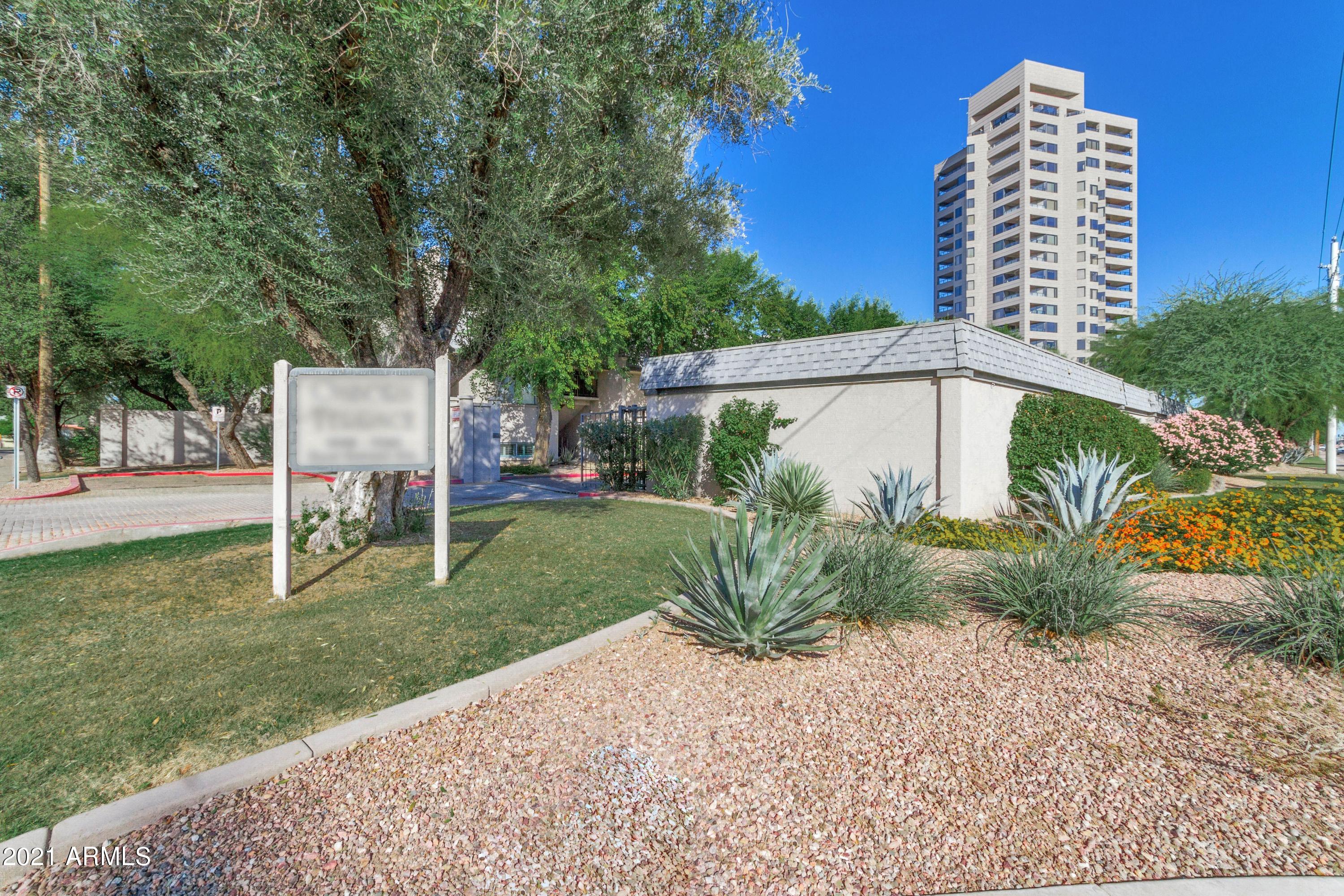 1002 East Osborn Road, Unit C Phoenix, AZ 85014 - Photo 15 of 15 a view of a back yard of the house